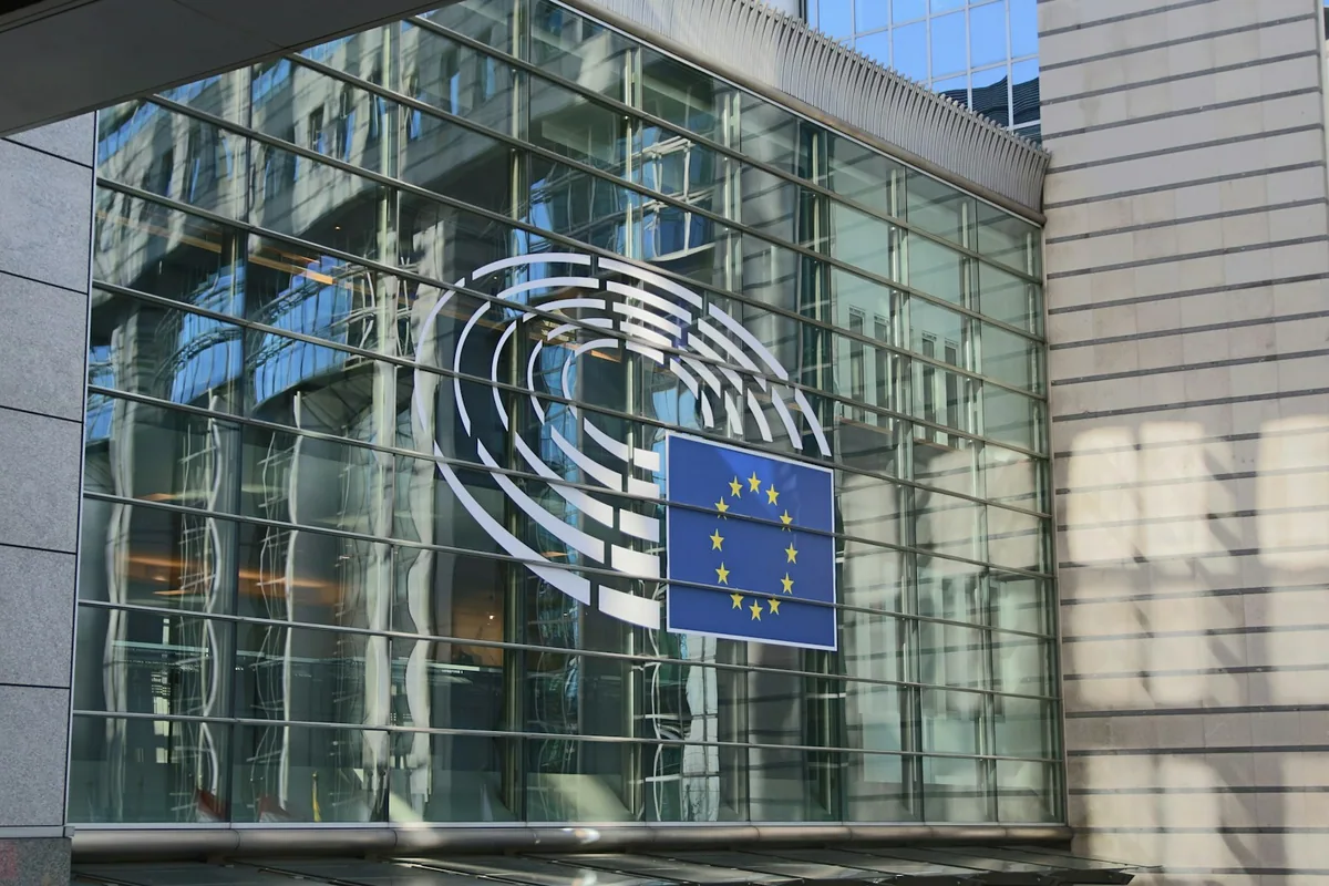 Glass facade of the European Parliament in Brussels.